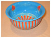A Bali stoneware jardiniere, decorated with red & blue stripes and pattern inside the bowl - first view.