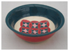 A Bali stoneware wide bowl, decorated with geomatric design using vibrant colour under glazes - second view
