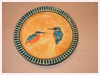 A Bali stoneware deep plate, decorated with a pair of kingfishers - third view.