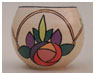 A Bali stoneware jardiniere, decorated with Macintosh style rose design on cream backgrund - first view.