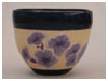 A Bali stoneware bowl, glazed with purple petunia with blue border - second view.