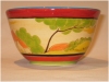 A Bali stonewae high bowl, paintd in Clarice Cliff style decorations - first view.
