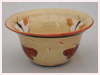 A Bali stoneware pot, glazed with 6 large butterflies on cream colour background - second view.