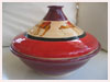 A Bali stoneware moroccan style casserole pot, decorated with camels on red and maroon background - second view.